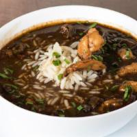Seafood Gumbo · Traditional Brown Roux Gumbo loaded with House Made Seafood Stock, Pork Andouille Sausage, O...