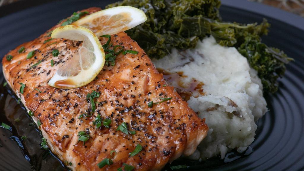 Salmon · 8 Ounce Filet of Salmon Grilled to Perfection served with a your choice of Sides.
