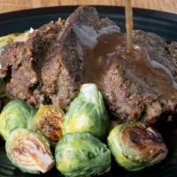 Meatloaf · Half Pound of Moms Meatloaf topped with House-Made Brown Gravy and your choice of Sides