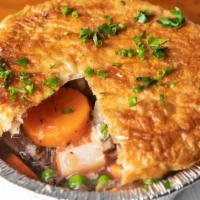 Beef Pot Pie · Personal Sized, made with Slow Roasted Beef, Peas, Carrots, Potatoes and a Rich & Creamy Sau...