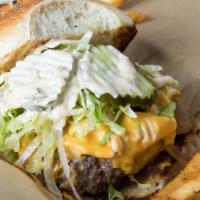 Lit Burger · OUR SPECIALTY!!  Our Hand Smashed 9oz Burger  served on a Hudson Bakery, Parker House, Butte...