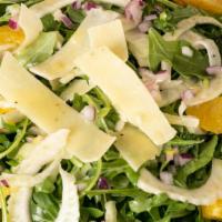 Citrus Fennel Salad · Fennel is the star of this Salad, tossed with Arugula, Shaved Red Onions, & Orange Segments....