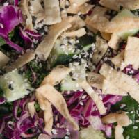 Asian Inspired Salad · Blend of Kale & Mixed Greens topped with Shredded Cabbage, Diced Cucumber, Edamame, Shredded...