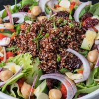 Quinoa Salad · Blend of Spinach, Iceberg, & Romaine topped with Quinoa, Garbanzo Beans, Diced Cucumber, Roa...