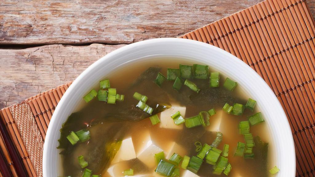 Housemade Miso Soup · A traditional Japanese soup with silken tofu, miso paste, dashi granules and green onion.