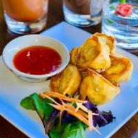 Crab Cheese · Six pieces. Imitation crab meat with cream cheese in crispy wonton.