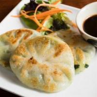 Chive Dumplings · Pan-fried or steamed with sweet soy sauce. Vegetarian.