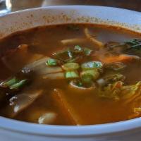 Tom Yum Soup · Spicy. Spicy soup with mushrooms and lemongrass broth.