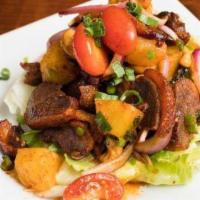 Duck Salad · Spicy. Crispy duck with red onion, tomatoes, scallion, pineapples and cashew nuts in spicy c...
