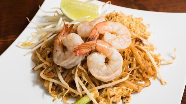 Pad Thai · Favorite. Traditional stir-fried thin rice noodles with egg, sweet radish, scallions, bean sprout and ground peanuts.