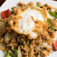 Kra Pow Kai Khai Dow · Spicy. Chopped up chicken with garlic, chili, onions, bell peppers, string beans, in basil s...