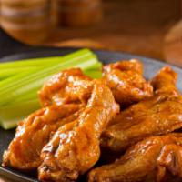 Buffalo Wings · 6 pieces served with choice of dip (blue cheese /ranch), celeries and carrots.