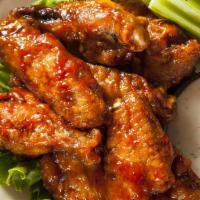 Sweet Chili Wings · 6 pieces served with choice of dip (blue cheese /ranch), celeries and carrots.