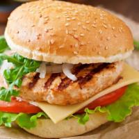 Grilled Chicken · Perfectly grilled chicken breast served on a  bun topped with lettuce, tomato, cheese.and sa...
