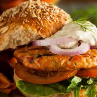 Grilled Salmon · 8 oz of grilled salmon served on a bun and topped with spinach, tomato, saute onions cheese....