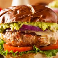 Turkey · Perfectly grilled turkey meat served on a bun and topped with guacamole, lettuce, tomato, ch...