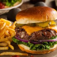 Cheeseburger · 8 oz. all beef patty served on a bun and topped with American cheese, saute onions, lettuce,...