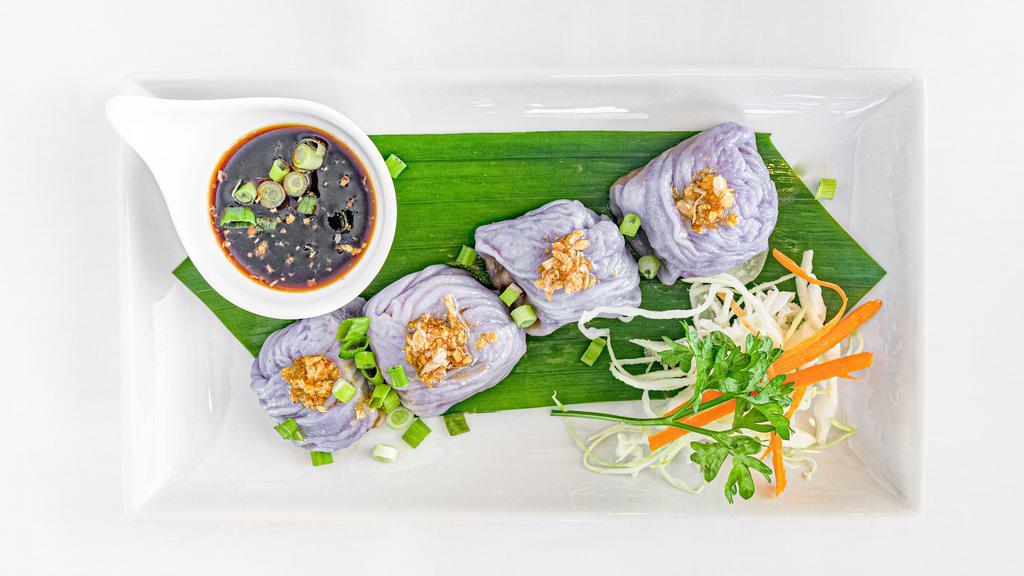 Peanut Dumpling · Tapioca flour, rice flour, wrapped with turnip, garlic, cilantro, peppers, red onion, ground peanuts, sugar, sweet soy sauce served with dumpling sauce.