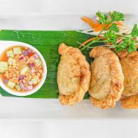 Vegetable Curry Puff · Puff pastry sautéed with peas, carrots, spinach, broccoli, curry powder served with dumpling...