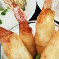 Shrimp Rolls · Wrapped and deep fried.