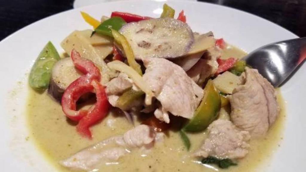 Green Curry · Eggplant, bamboo shoots, bell pepper and fresh basil in a fresh chili coconut sauce. Served with jasmine rice. Hot and spicy.