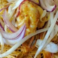 Khow Soy · Northern style fried egg noodles with red onion and bean sprouts in a dried chili coconut sa...