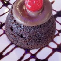 Chocolate Lava Cake · Delicious warmed chocolate cake with an eruption of oozing molten chocolate