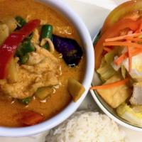 Red Curry · Bamboo, eggplant, string bean, bell pepper, basil with coconut milk and spicy curry.