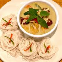 Thai Noodle With Green Curry · Green curry with bamboo, eggplant, bellpepper and basil. Served with Thai rice noodle.