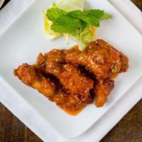 Spicy Wing · Fried chicken wings cooked with house spicy sauce.