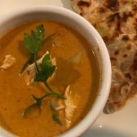 Roti Curry · Roti bread served with chicken in Massaman Curry dipping sauce.