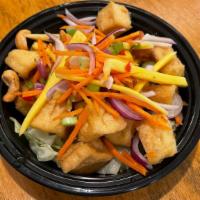 Tofu Salad · Fried tofu, red onion, scallion, carrot and cashew nut with chili lime sauce. Spicy.