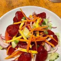 Sweet Sausage Salad · Thai sweet sausage, red onion, cucumber, carrot, scallion, tomato with chili lime juice.