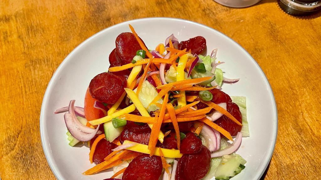 Sweet Sausage Salad · Thai sweet sausage, red onion, cucumber, carrot, scallion, tomato with chili lime juice.