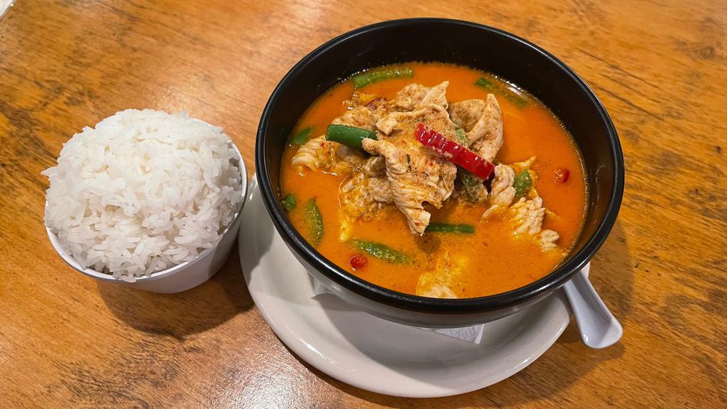 Panang Curry · String bean, bell pepper with coconut milk and medium spicy curry.