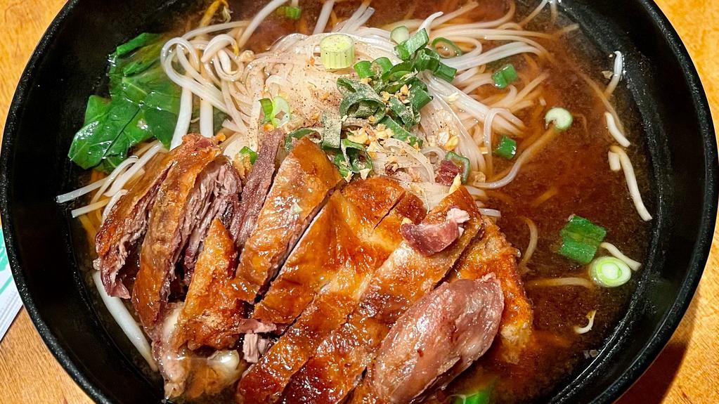 Duck Noodle Soup · Rice small noodle, chinese broccoli, bean sprout and scallion in duck soup topped with Crispy Duck.
