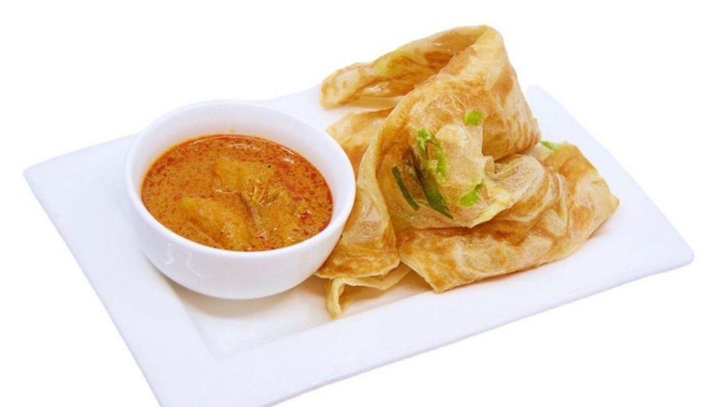 Roti Scallion Pancake 葱油饼 · Spicy. Served with curry potato chicken sauce.