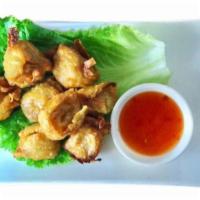 Crispy Wontons 炸云吞 · Fried shrimp and pork wontons.