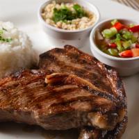 Top Sirloin · Our signature cut picanha. Served with white rice, yucca flour with bacon and vinaigrette sa...