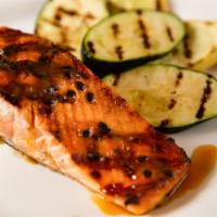 Grilled Salmon · Housemade Passion Fruit sauce & vegetables.