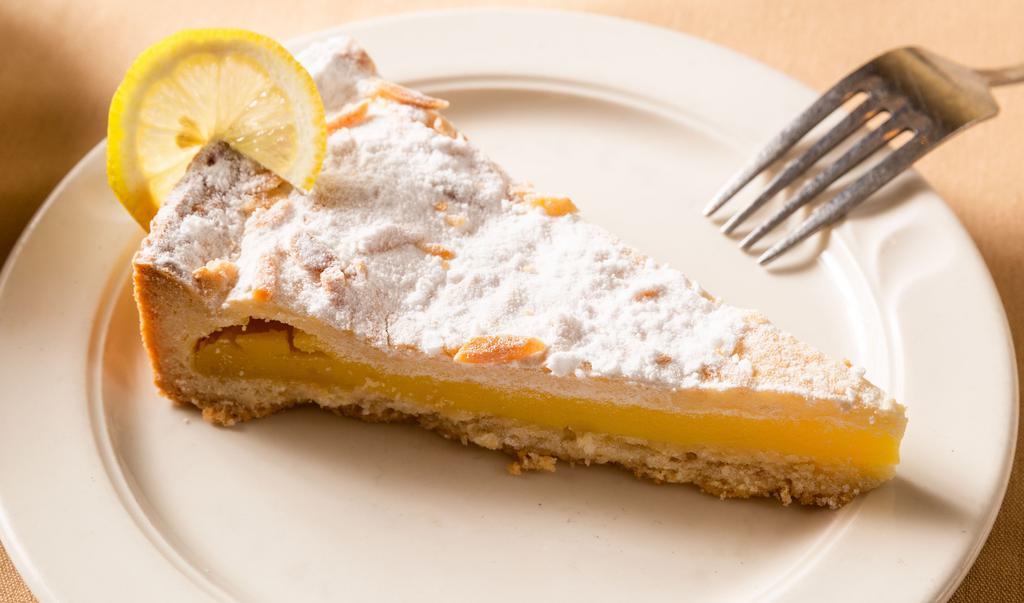 Torta Della Donna · Pastry with lemon zest and a vanilla custard