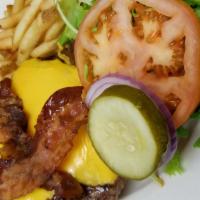 American · Beef patty, American cheese, lettuce, tomato, onion, pickles, and mayo.