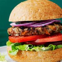 Swiss · Beef patty, swiss cheese, grilled mushroom and onions, lettuce, tomato, and mayo.