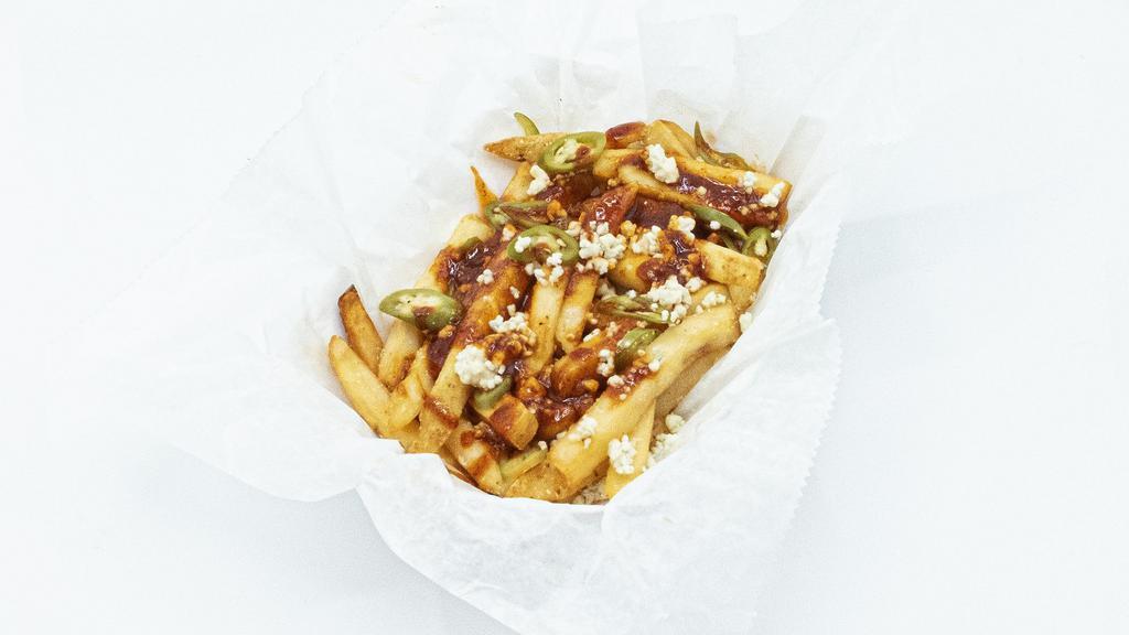 Spicy Fries · Volcano HOT Sauce Drizzle, Pickled Serrano, Blue Cheese Crumbles, Grated Parm-Reggiano