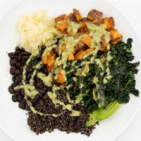 Veggie Bowl · Red quinoa, beans, potatoes, sautéed kale, and onions, avocado, sauerkraut, green tahini dre...