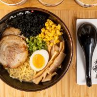 Tokyo Tonkotsu Shoyu Ramen · Chashu pork, half marinated egg, bamboo shoots, corn, wakame, scallions, and nori.