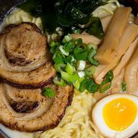 Kyushu Tonkotsu Shio Ramen · Chashu pork, half marinated egg, bamboo shoots, corn, wakame, scallions, and nori.