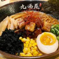 Japanese Curry Ramen · Diced chashu or tonkatsu, bamboo shoots, corn, wakame, half marinated egg, scallions, and no...
