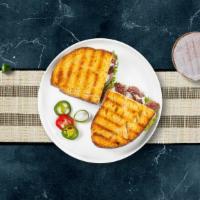 Russian Panini · Roasted beef, Muenster cheese, caramelized onions, lettuce, plum tomatoes, and Russian dress...