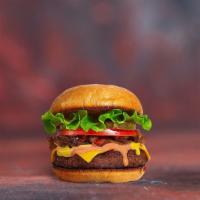 Veggie Classic Mani Burger · Seasoned vegetarian patty topped with lettuce, tomato, onion, and pickles. Served on a warm ...